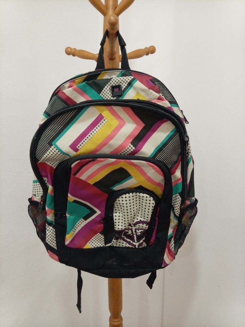 Rush Sale Price Drop! 😊 Roxy Backpack - Colorful Design (Category: Backpacks) located in Makati City. Submitted by giovandbertha1 (Listing ID 1422477474, Image 1). Description: - Roxy backpack with a vibrant, colorful pattern. - Main compartment with zipper closure. - Front pocket for extra storage. - Side mesh pockets for water bottles. - Black base and straps. - Standard size, perfect for everyday use or school..