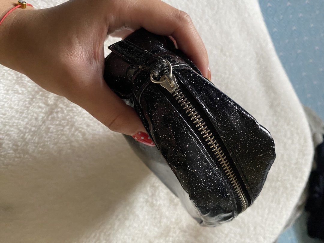 Sephora Black Glitter Cosmetic Bag (Category: Makeup) located in Quezon City. Submitted by dcltrrr8 (Listing ID 1422404364, Image 3). Description: Sephora VIP Rouge. Well used but not abused. Just needes cleaning inside. Signs of usage are visible. 6x4x2 inches.