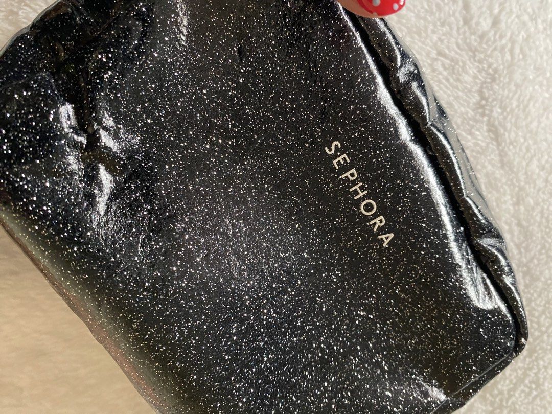 Sephora Black Glitter Cosmetic Bag (Category: Makeup) located in Quezon City. Submitted by dcltrrr8 (Listing ID 1422404364, Image 2). Description: Sephora VIP Rouge. Well used but not abused. Just needes cleaning inside. Signs of usage are visible. 6x4x2 inches.