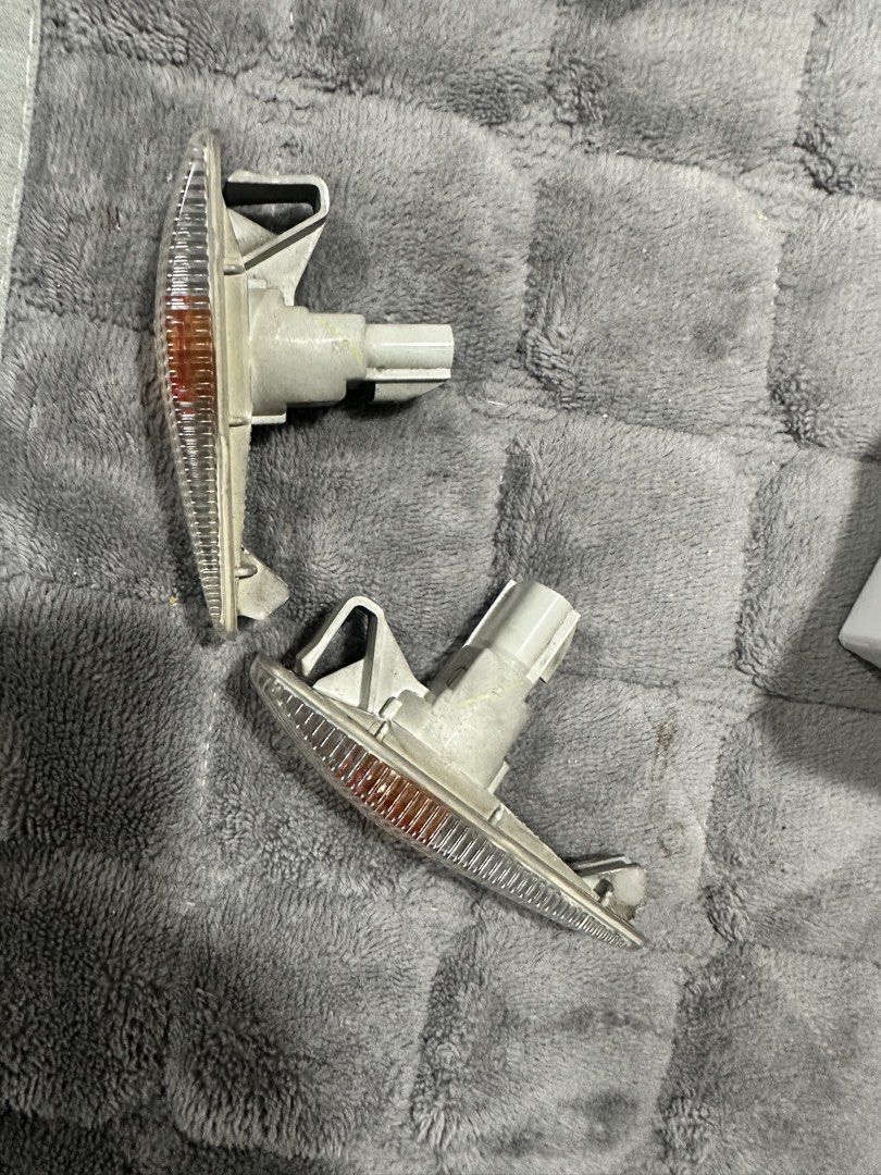 Side Marker Lights (Category: Everything Else Others) located in Bulacan. Submitted by primepoint (Listing ID 1422515741, Image 1). Description: - Pair of side marker lights - Includes two pieces - Clear lens with amber reflector - Visible connectors - Original front fender lights of Mitsubishi Mirage Glx. .