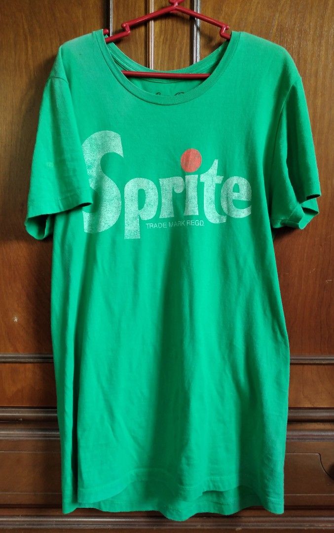 Sprite Coca-Cola Green T-shirt - Medium (Category: Tshirts & Polo Shirts ) located in Baguio. Submitted by tipiditis (Listing ID 1422421108, Image 1). Description: - Green Sprite T-shirt - Features the Sprite logo - Size: Medium - Material: 60% cotton, 40% polyester - Minor hole on the front and back - Plain green back Color: 6/10 because of the fading at shoulders area and back (check photos) Size: Length 29 inches, Armpit to armpit 19 inches Ma