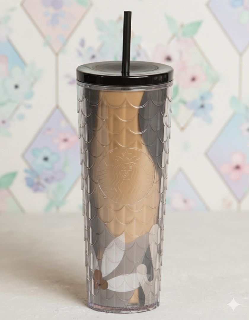 Starbucks traditions 2026 cold cup (Category: Water Bottles & Tumblers) located in Pasig City. Submitted by getstuffph (Listing ID 1422521588, Image 1). Description: - Starbucks tumbler with a scale-like design - Features a black lid and matching straw - Clear body with a stylish gold and gray pattern - Includes the iconic Starbucks logo - Ideal for cold beverages - brand new with box.