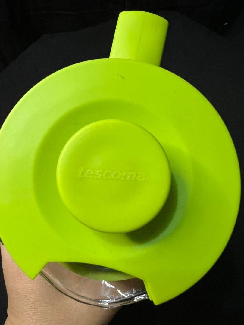 Tescoma Tea Infuser Pitcher (Category: Coffee & Tea Tableware) located in Marikina City. Submitted by caiteeekat (Listing ID 1422461395, Image 2). Description: Tescoma tea infuser pitcher. Clear glass with green accents. Includes infuser..