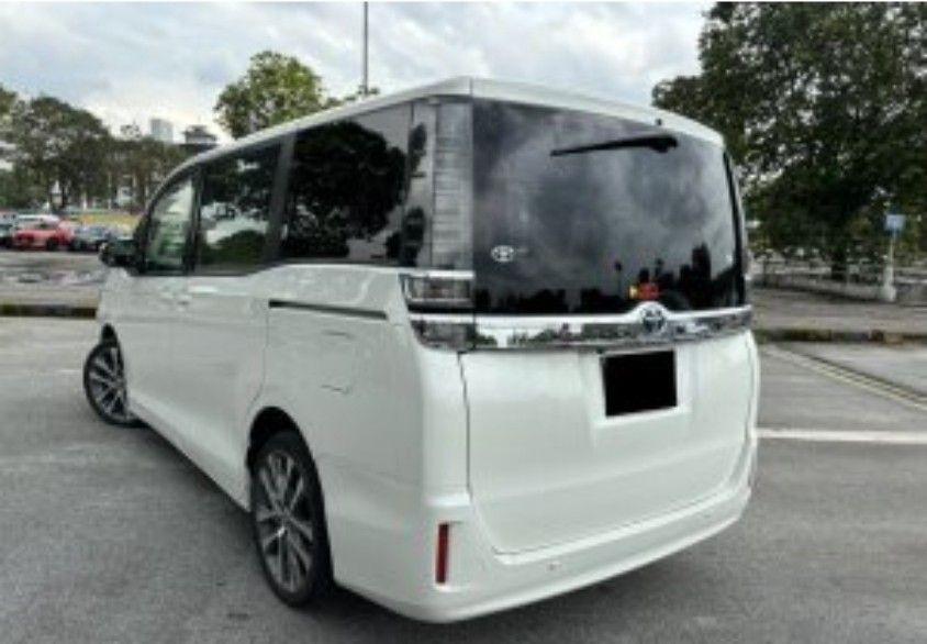 Toyota Voxy Hybrid 1.8 V (A) (Category: Used Cars) located in Singapore. Submitted by victorchualh (Listing ID 1422334208, Image 3). Description: Toyota Voxy Hybrid 1.8 V (A) Reliable, spacious, and fuel-efficient hybrid MPV—perfect for families or daily driving. Key Features: 1.8L Hybrid engine with excellent fuel economy Smooth Automatic transmission Spacious 7-seater cabin with flexible seating arrangement Dual power sliding doors for easy acc