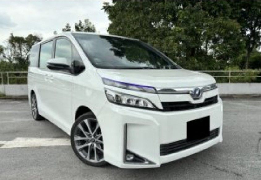 Toyota Voxy Hybrid 1.8 V (A) (Category: Used Cars) located in Singapore. Submitted by victorchualh (Listing ID 1422334208, Image 1). Description: Toyota Voxy Hybrid 1.8 V (A) Reliable, spacious, and fuel-efficient hybrid MPV—perfect for families or daily driving. Key Features: 1.8L Hybrid engine with excellent fuel economy Smooth Automatic transmission Spacious 7-seater cabin with flexible seating arrangement Dual power sliding doors for easy acc