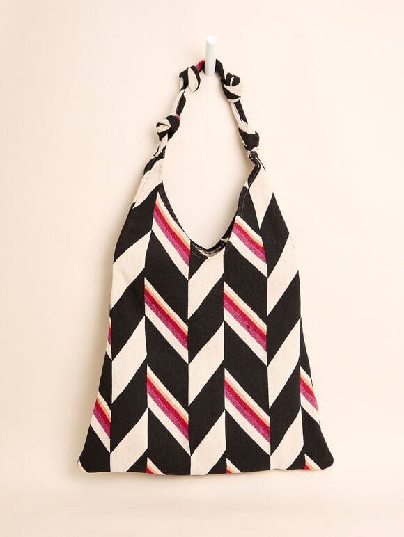 Zara Hobo Tote Bag / Beach Bag (Category: Tote Bags) located in Quezon City. Submitted by teetharejade (Listing ID 1408574359, Image 1). Description: Stylish extra large woven tote bag from Zara. Features a striking chevron pattern in black, cream, and shades of fuchsia. The bag has a long strap. The bag falls to your knees - very spacious. Made in India..