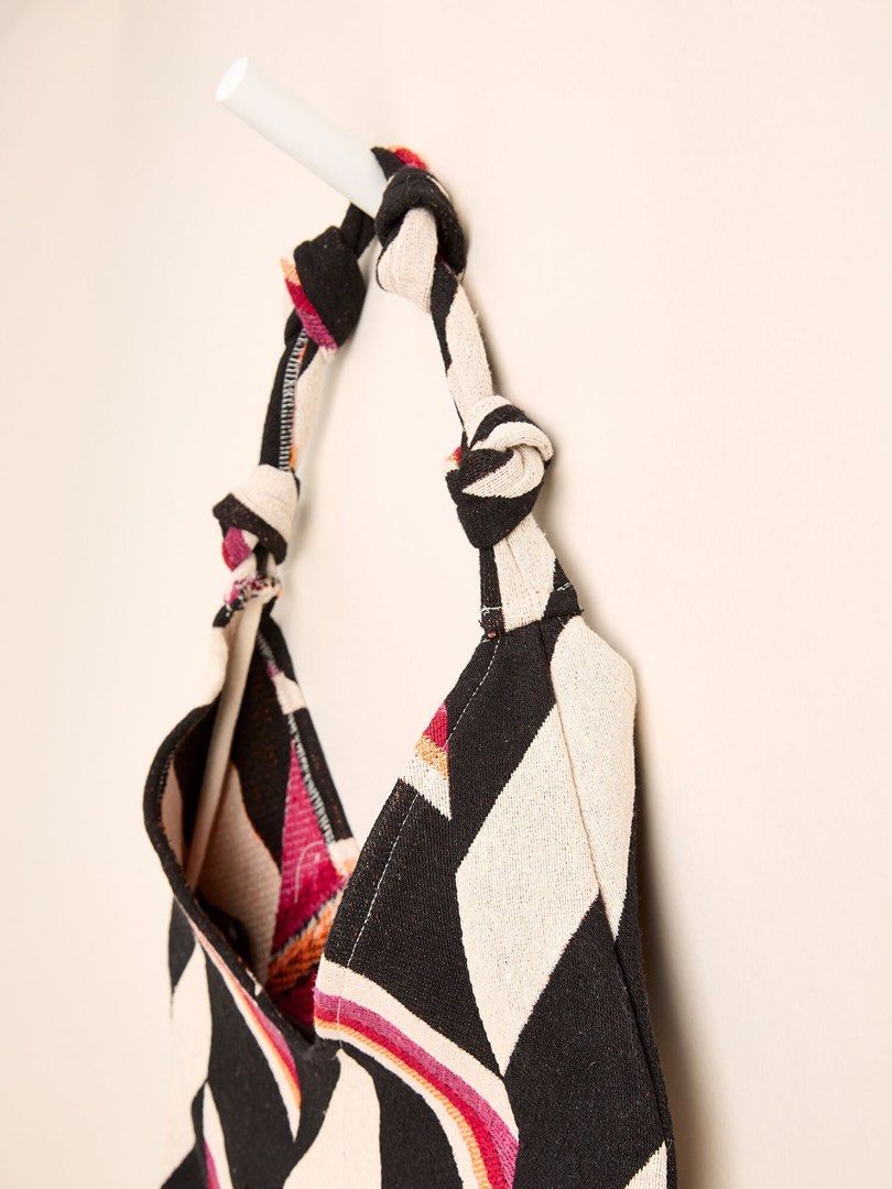 Zara Hobo Tote Bag / Beach Bag (Category: Tote Bags) located in Quezon City. Submitted by teetharejade (Listing ID 1408574359, Image 2). Description: Stylish extra large woven tote bag from Zara. Features a striking chevron pattern in black, cream, and shades of fuchsia. The bag has a long strap. The bag falls to your knees - very spacious. Made in India..