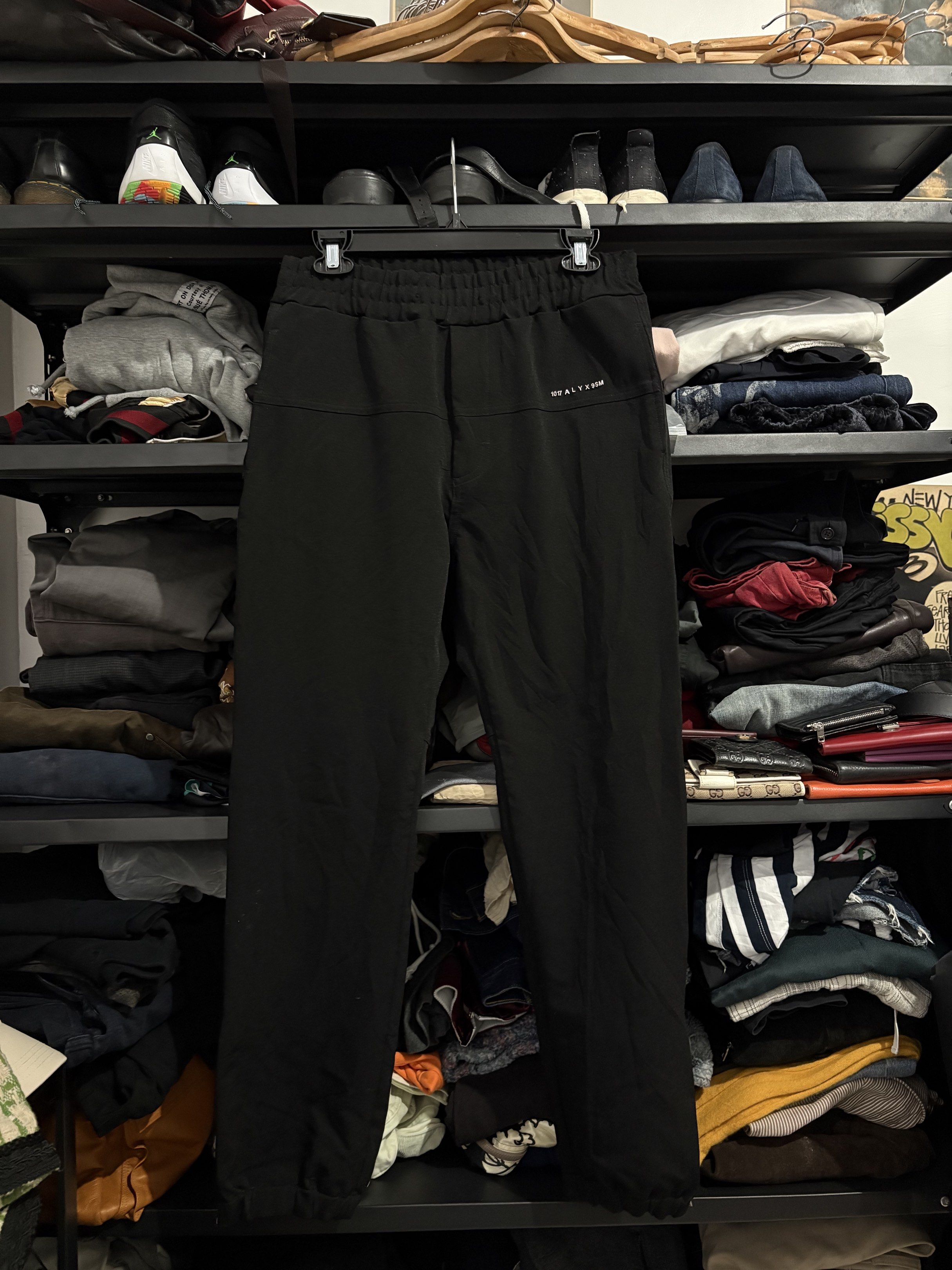 1017 ALYX 9SM Stripe panel Black Pants (Category: Jeans) located in Naga. Submitted by archivedseller (Listing ID 1422638584, Image 1). Description: - 1017 ALYX 9SM black pants - Size: S - Features: - Drawstring waist - Side pockets - Ankle zippers - Visible brand logo - Made in China - Material: Polyester, polyamide, elastane blend -9.5/10 Condition -Missing Drawstring -Waist 30-36 -Lenght 39 inches.