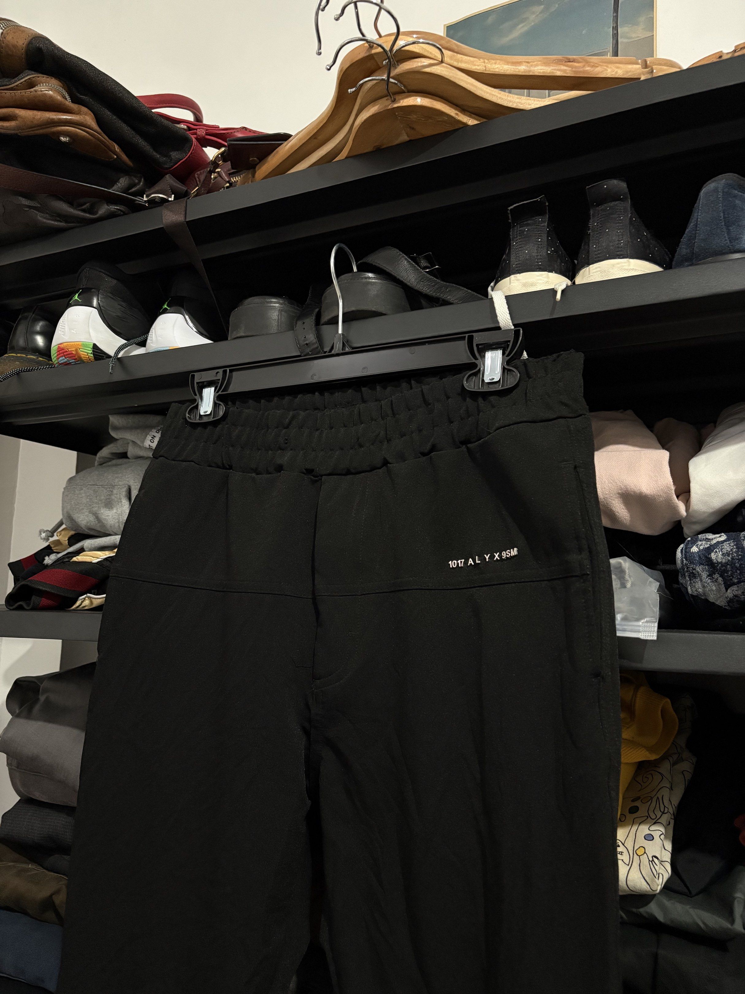 1017 ALYX 9SM Stripe panel Black Pants (Category: Jeans) located in Naga. Submitted by archivedseller (Listing ID 1422638584, Image 3). Description: - 1017 ALYX 9SM black pants - Size: S - Features: - Drawstring waist - Side pockets - Ankle zippers - Visible brand logo - Made in China - Material: Polyester, polyamide, elastane blend -9.5/10 Condition -Missing Drawstring -Waist 30-36 -Lenght 39 inches.