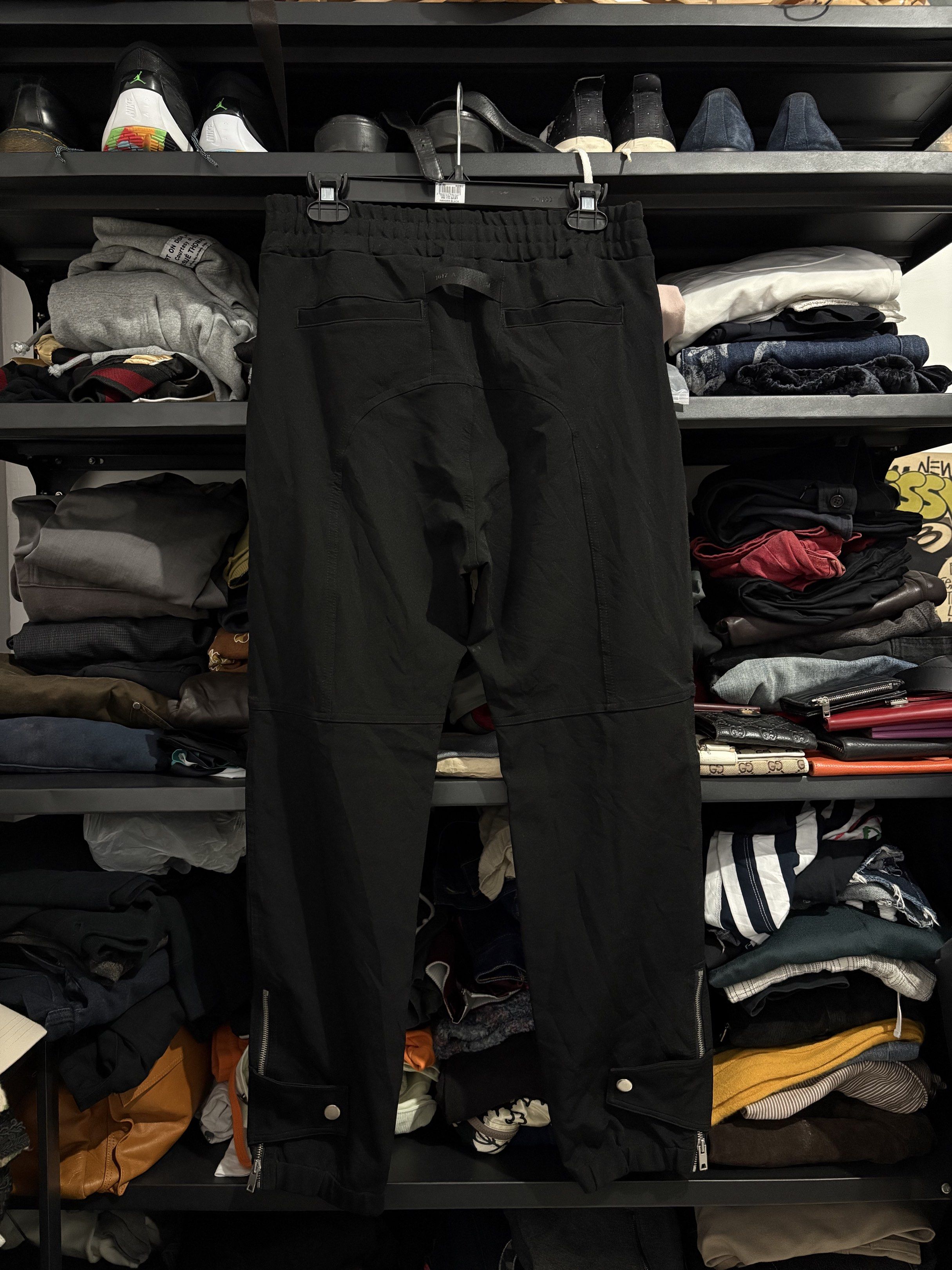 1017 ALYX 9SM Stripe panel Black Pants (Category: Jeans) located in Naga. Submitted by archivedseller (Listing ID 1422638584, Image 2). Description: - 1017 ALYX 9SM black pants - Size: S - Features: - Drawstring waist - Side pockets - Ankle zippers - Visible brand logo - Made in China - Material: Polyester, polyamide, elastane blend -9.5/10 Condition -Missing Drawstring -Waist 30-36 -Lenght 39 inches.