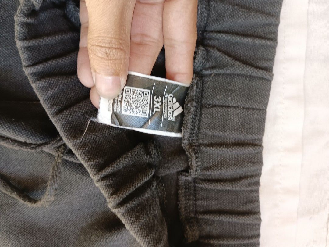 Adidas Black Jogger Pants 3XL (Category: Joggers) located in Rizal. Submitted by thriftbycho (Listing ID 1422641468, Image 3). Description: - Adidas black jogger pants - Size: 3XL - Features Adidas logo on left leg - Three-stripe design on the side - Drawstring waist - Zippered pocket.