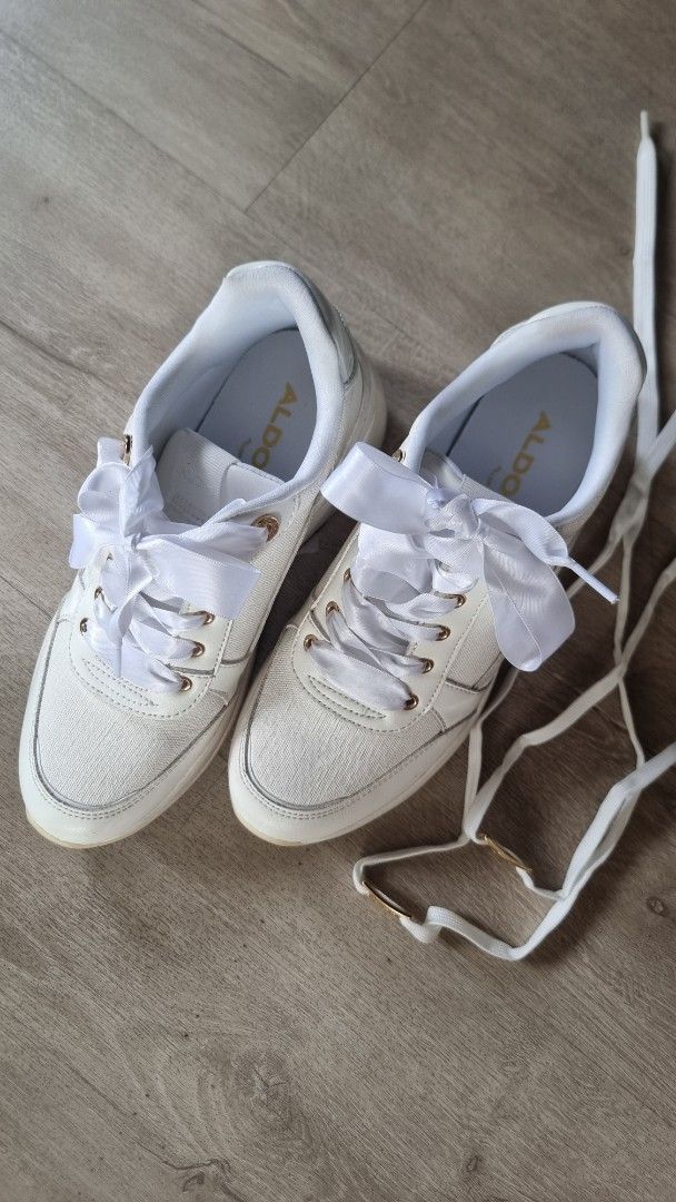 Wedding Sneakers Aldo Off White Platform Shoes Core Edge (Category: Sneakers) located in Cainta. Submitted by cqmpreloved (Listing ID 1422657978, Image 3). Description: Aldo Core Shoes Sneakers Original Price at 5.6k. Used once for my wedding. Off White Color, fabric outer, rubber soles, platform at almost 3 inches high. Size 8 for womens Lace changed to satin for a wedding, still comes with original white shoe lacws, comes with the original box 