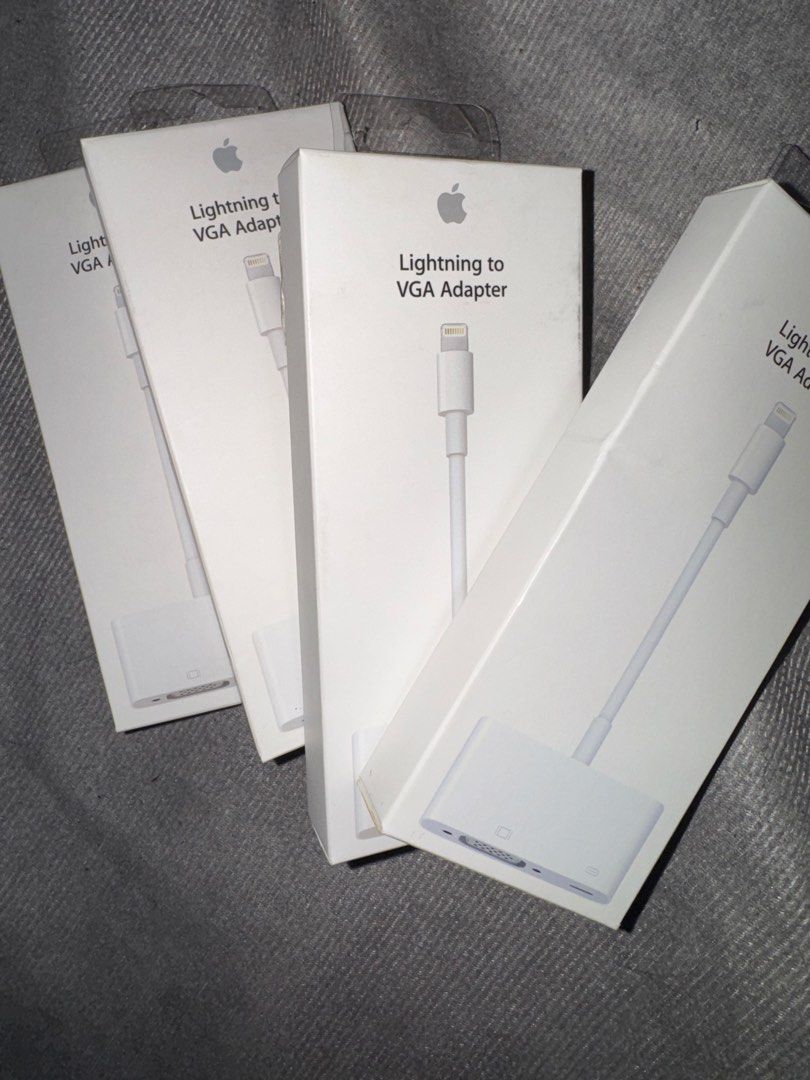 Apple Lightning to VGA Adapter (Category: Cables & Adaptors) located in Quezon City. Submitted by kentivan21 (Listing ID 1422569896, Image 1). Description: Authentic Orig Price 2990 300 each.