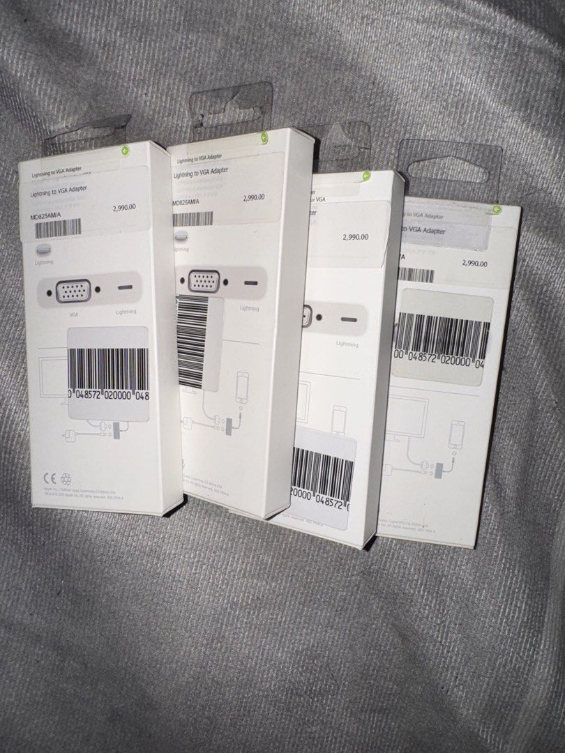 Apple Lightning to VGA Adapter (Category: Cables & Adaptors) located in Quezon City. Submitted by kentivan21 (Listing ID 1422569896, Image 2). Description: Authentic Orig Price 2990 300 each.