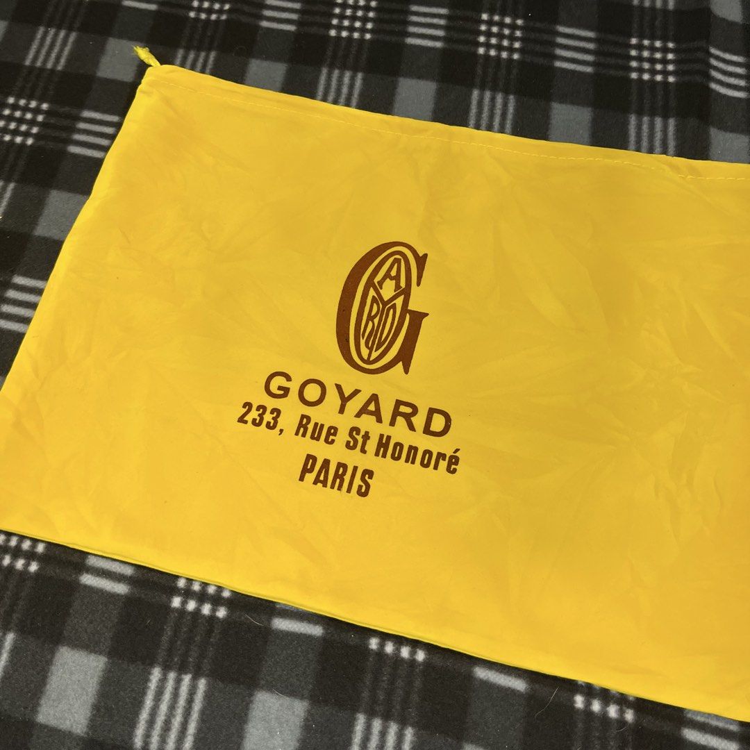 (AUTHENTIC) Goyard Dust Bag (Small) (Category: Luxury Bags & Wallets) located in Bacolod City. Submitted by pastforward.6100 (Listing ID 1422655935, Image 2). Description: - Authentic Goyard dust bag - Yellow color - Drawstring closure - Features Goyard logo and address: 233, Rue St Honoré, Paris - Perfect for protecting your Goyard items.