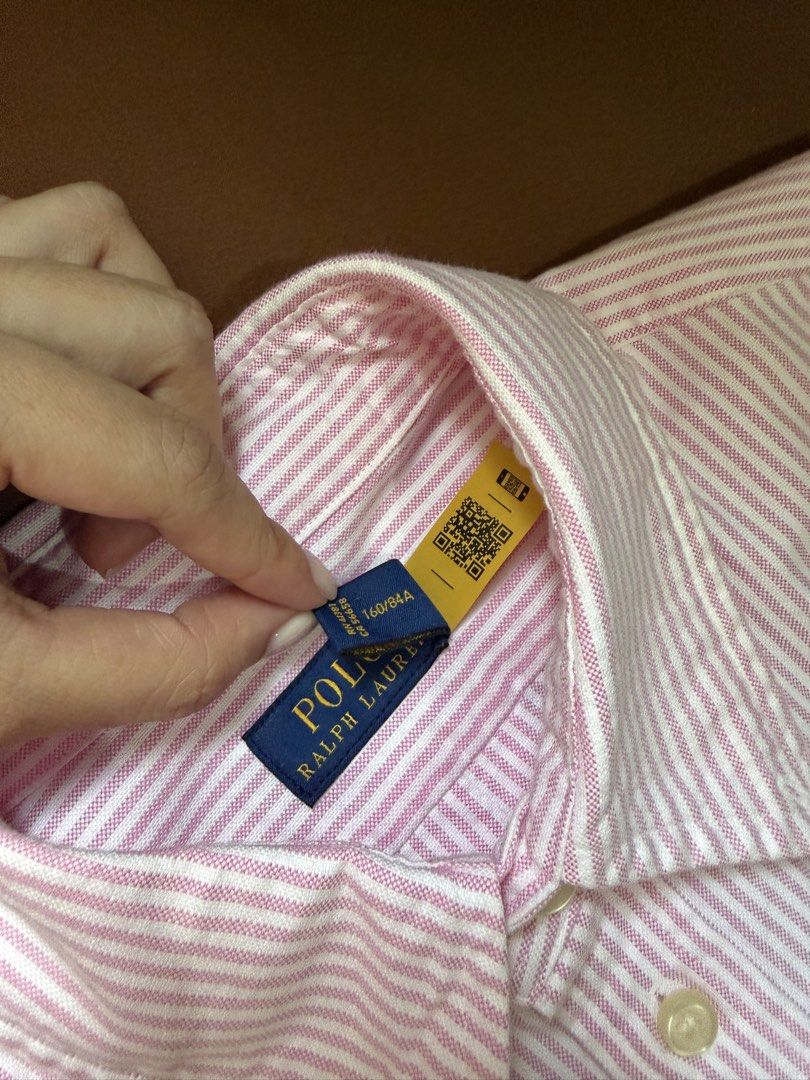 Authentic Ralph Lauren Oxford (w/QR) (Category: Longsleeves) located in Manila. Submitted by piagon (Listing ID 1422609712, Image 3). Description: Authentic RL Pink Stripes Oxford w/ QR for authenticity Small Classic fit Brandnew. Washed only but unworn. Bought this from a personal shopper in NY for 6k Rfs: I prefer XS size since this is classic fit MOP: BPI/Gcash MOD: Lalamove/Grab/GogoExpress/J&T c/o buyer. No COD. 📍España Manila near UST NO L