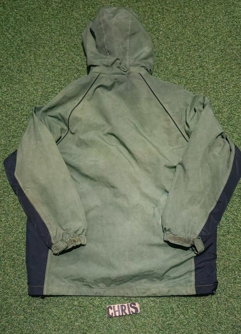 Vtg Balenciaga Hooded (removable Jacket (Category: Coats, Jackets and Outerwear) located in Reina Mercedes. Submitted by SIRCHIVES (Listing ID 1422623088, Image 2). Description: - Balenciaga hooded jacket - Color: Green with black accents - Size: 5 (Xl) - Features: Hood, front zipper, Balenciaga logo - Material: 100% nylon outer shell, 100% polyester lining - Style number: BJ90645-49.