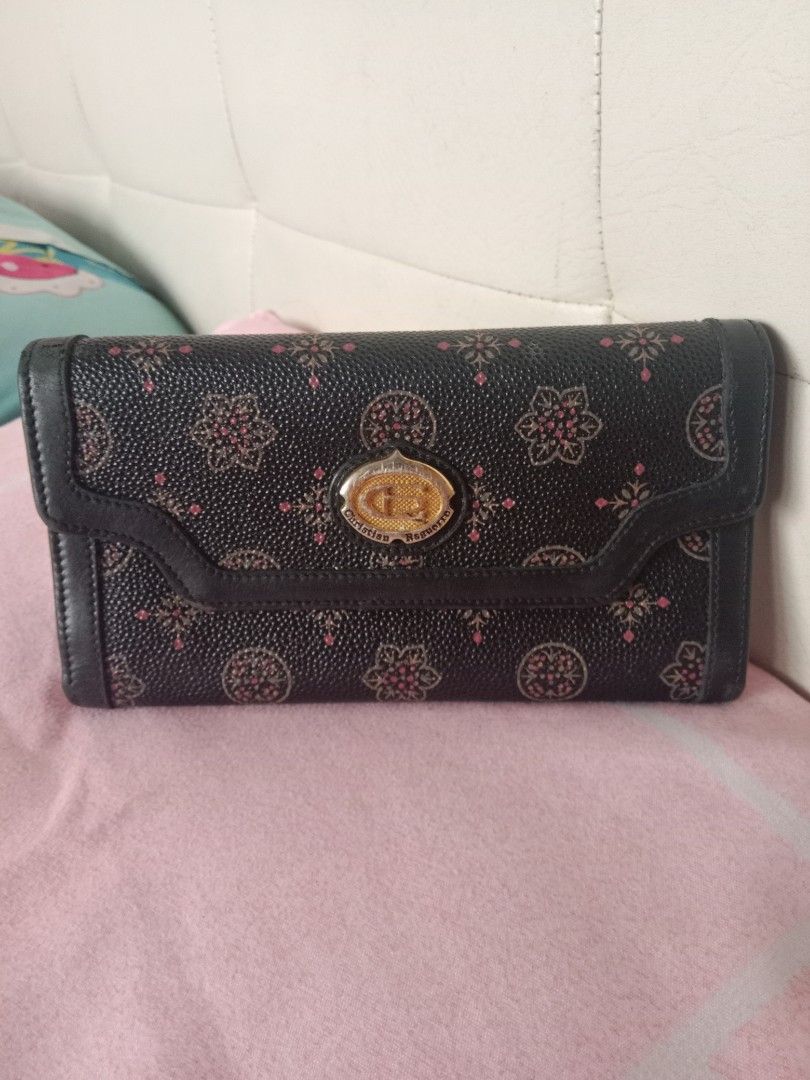 Black Patterned Wallet (Category: Wallets & Card holders) located in Bulacan. Submitted by chubbylicious (Listing ID 1422551754, Image 1). Description: - Black patterned exterior - Gold-colored clasp and hardware - Multiple card slots - Clear ID window - Zippered compartment - Leather or leather-like material.