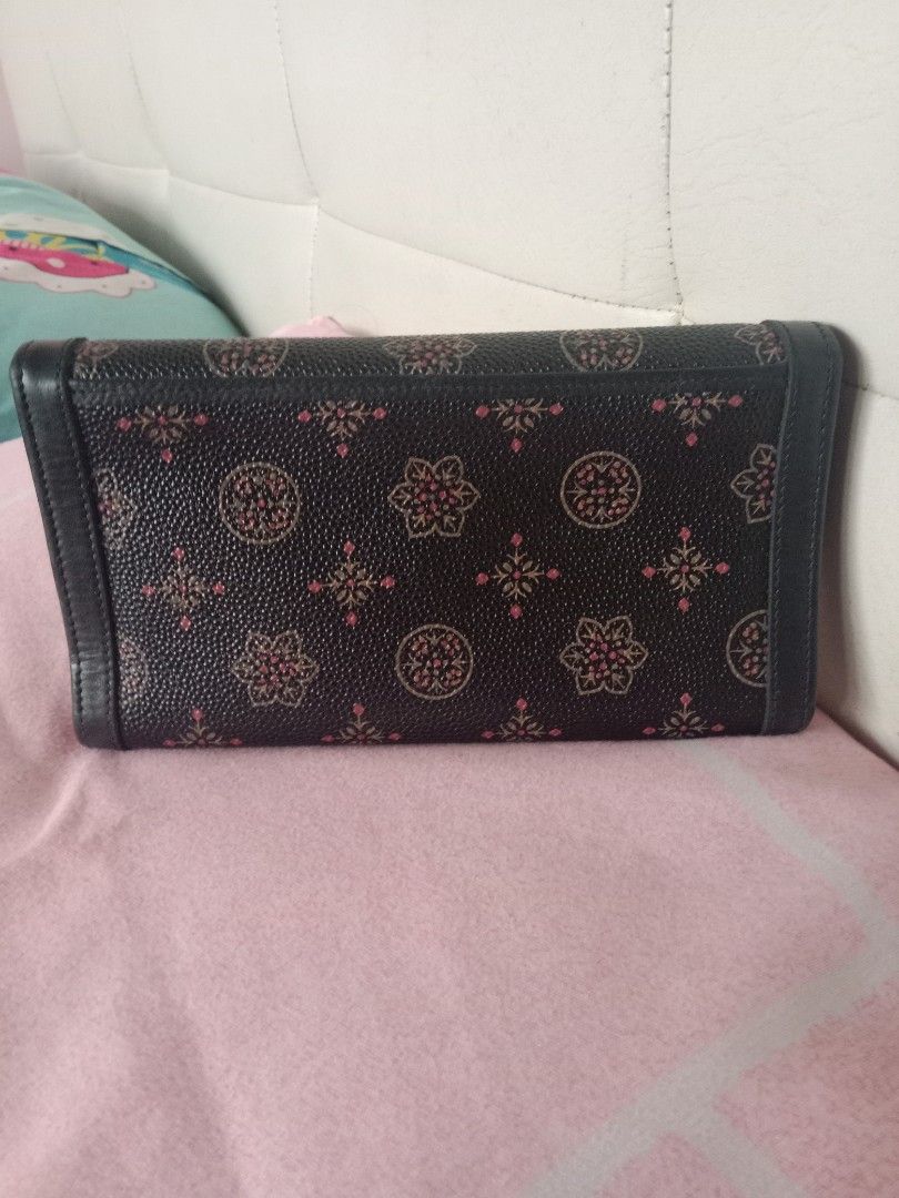 Black Patterned Wallet (Category: Wallets & Card holders) located in Bulacan. Submitted by chubbylicious (Listing ID 1422551754, Image 2). Description: - Black patterned exterior - Gold-colored clasp and hardware - Multiple card slots - Clear ID window - Zippered compartment - Leather or leather-like material.