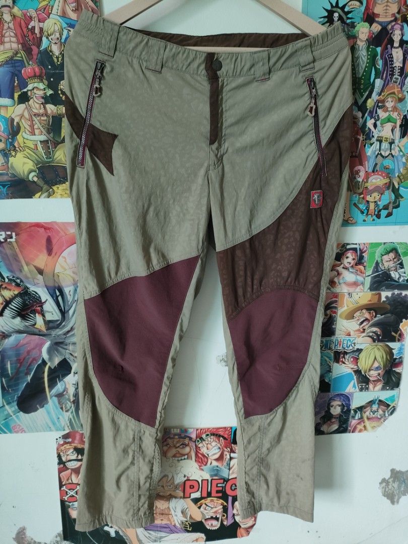 Black Yak Outdoor Pants (Category: Trousers) located in Davao. Submitted by calithrift123 (Listing ID 1422604922, Image 1). Description: - Black Yak outdoor pants -Dimension: 16 width x 35 length x 6.5 innings - Multiple pockets and zippers - Unique design with brown and maroon accents - Light brown color - Features Black Yak logo (front and back) - Button closure - Includes brand tag flaw: Bleach stain.