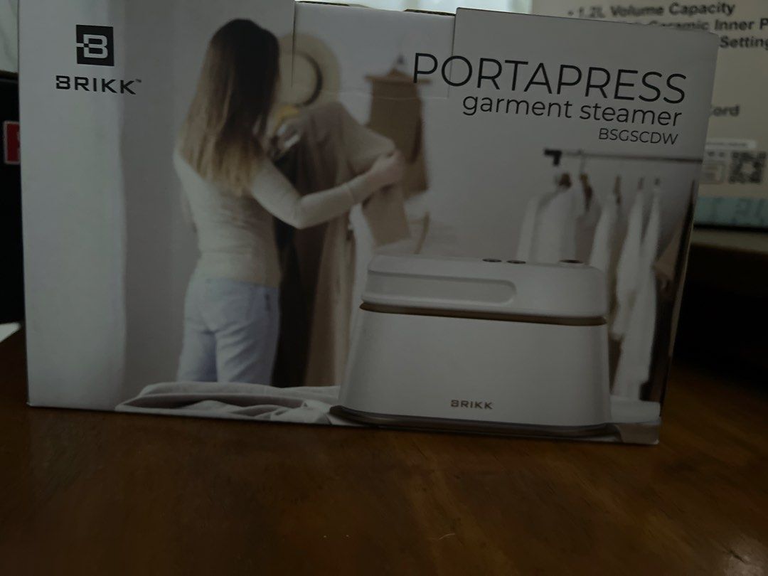 BRIKK PORTAPRESS Garment Steamer (Category: Irons & Steamers) located in Quezon City. Submitted by marirodrigo (Listing ID 1422561838, Image 1). Description: - BRIKK PORTAPRESS Garment Steamer - 1.2L Volume Capacity - Ceramic Inner Parts - Model: BSGSCDW - Effortlessly removes wrinkles - Freshens clothes quickly.