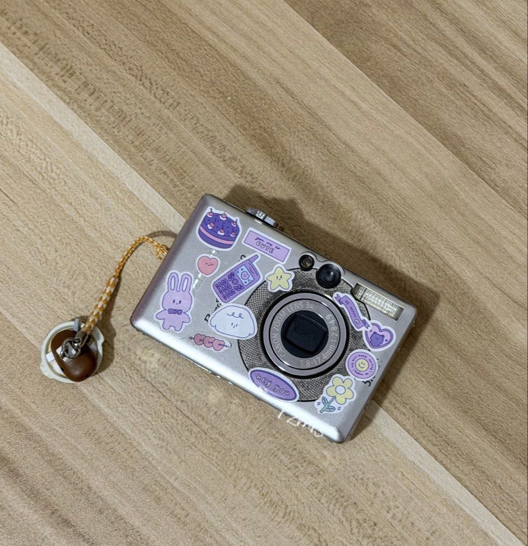 Canon Powershot SD300 digital camera (Category: Cameras) located in Cabanatuan. Submitted by rzmrs (Listing ID 1422698651, Image 1). Description: 🛒 canon powershot sd300 digital camera ₱2500 + lsf • disclaimer: not entirely sure about the model since i got this years ago pa and the front got covered na by stickers 😅 • please see other pictures in the next slides & videos here: https://drive.google.com/drive/mobile/folders/1HLfEpdCOC6UmmTJfRYxzu