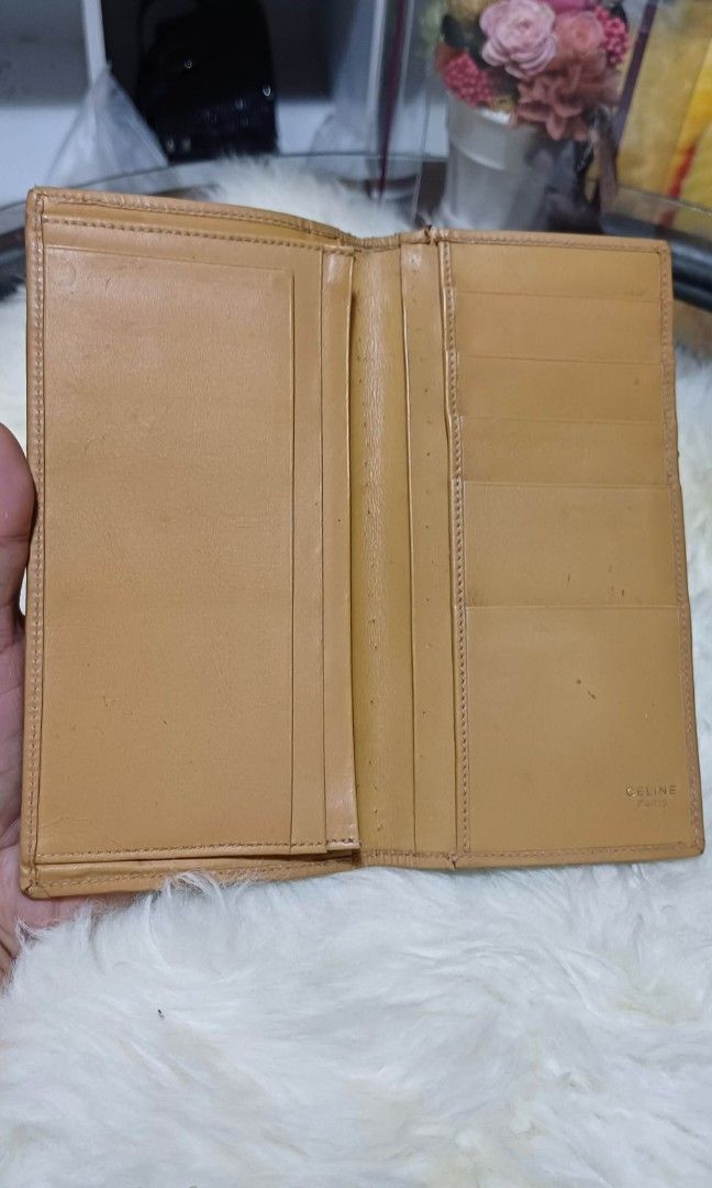 Celine bifold long wallet (Category: Luxury Bags & Wallets) located in Tagum. Submitted by ynez.luxurypicksph (Listing ID 1422581927, Image 2). Description: preloved Japan please check photos closely for the issues.