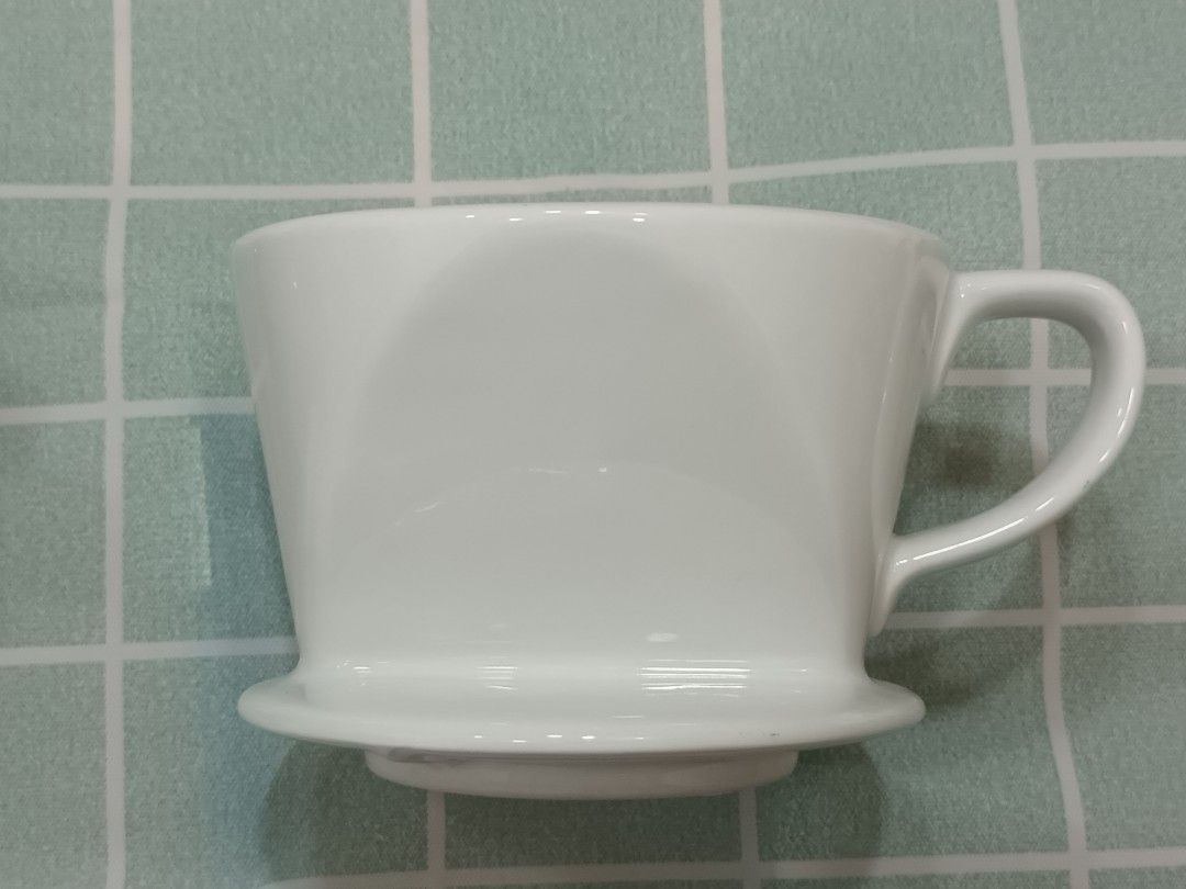 Ceramic Coffee Drip (Category: Coffee & Tea Tableware) located in Calamba. Submitted by m_brian (Listing ID 1422655692, Image 1). Description: - Ceramic coffee dripper - Cone-shaped design - Features vertical ridges, 3 holes - Designed for pour-over coffee brewing.