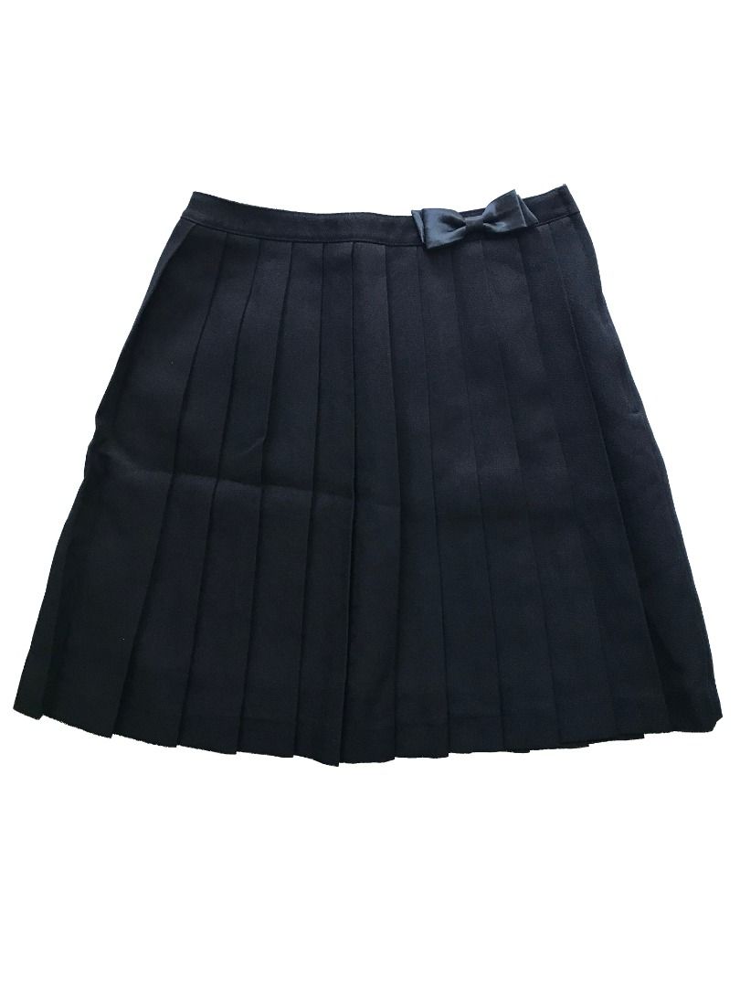 Chopin Deux Pleated Skirt with Bow (Category: Skirts) located in Bulacan. Submitted by roomarchive (Listing ID 1422700598, Image 1). Description: - Chopin Deux pleated skirt - Features a bow detail - Zipper closure - Dark fabric - Waist: 24in - Length: 17in - Classic design, versatile for various occasions.