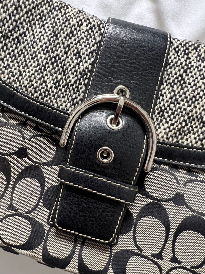 Coach Soho Black Canvas Monogram Leather Shoulder Bag (Category: Luxury Bags & Wallets) located in Quezon City. Submitted by declutterwjjj (Listing ID 1422575847, Image 2). Description: A vintage staple. Signature soho bag in canvas and leather. In Excellent Condition -minimal sign of use -unnoticeable hairline in hardware -leather still looks new Details 1 Zipper Pocket, 2 open pockets Hardware: Silver Tone Code: G06W-F10425 Zip: укк Approximate