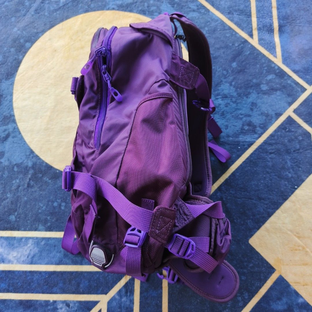 Dakine Urban Pro II Backpack - Purple (Category: Backpacks) located in Bayombong. Submitted by easyflip_04 (Listing ID 1422642119, Image 2). Description: - Dakine Urban Pro II backpack - Vibrant purple color - Multiple compartments for organization - Adjustable straps for a comfortable fit - Side pockets for easy access - Dakine logo on front and back - Secure storage with buckles and zippers.