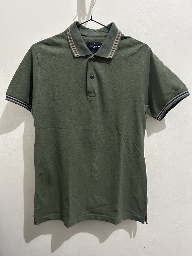 Daniel Hechter Polo Shirt - Olive Green (Category: Tshirts & Polo Shirts ) located in Mandaluyong City. Submitted by ncooooooo (Listing ID 1422634826, Image 1). Description: Daniel Hechter polo shirt Best for Small to Medium W: 18.5” L: 26.5” - Olive green color - Classic collar with striped details - Short sleeves with striped cuffs - Small logo on chest - Button-up placket - Comfortable fabric - Ideal for casual wear.