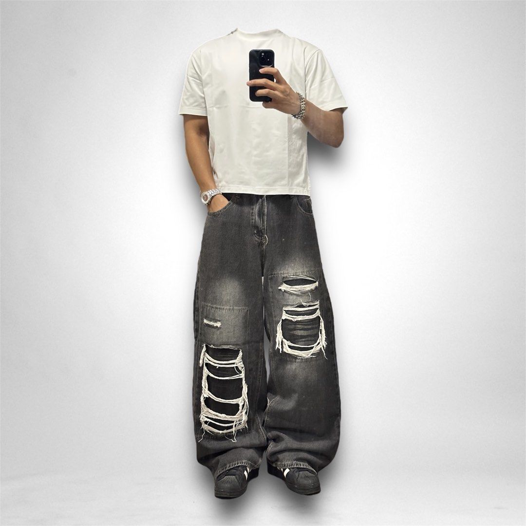 Distressed Washed Black Super Baggy Jeans (Category: Jeans) located in San Pedro. Submitted by karluash (Listing ID 1381424842, Image 3). Description: Waist: 30-32 inches Length: 43 inches Thighs: 14 inches Leg Opening: 12 inches Flaws: distressed hem .
