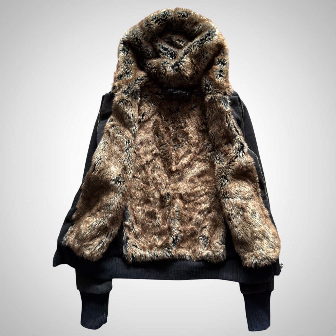 Dolce & Gabbana Fur Hooded Jacket (Category: Luxury Apparel) located in Zamboanga. Submitted by the.angura.store (Listing ID 1422713889, Image 1). Description: Dolce & Gabbana Ribbed Knit Fur Zip-Up Hoodie In classic Dolce & Gabbana fashion, this ribbed knit fur hoodie is the epitome of early 2000’s aesthetic. Classic ribbed knit & hem hoodie lined with fur for statement & comfort. Zip-up closure, zippered pockets and D&G metal emblem on the ches