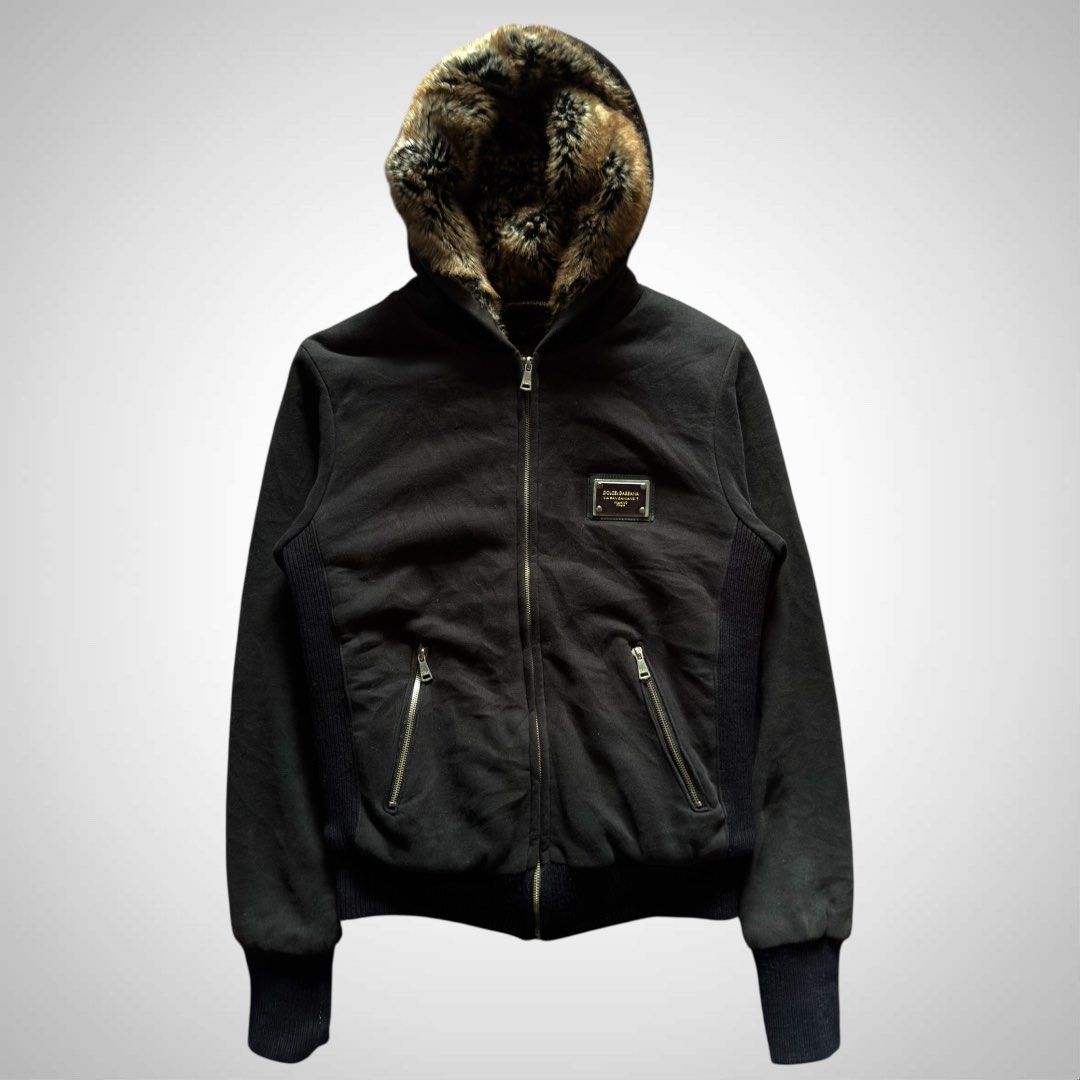Dolce & Gabbana Fur Hooded Jacket (Category: Luxury Apparel) located in Zamboanga. Submitted by the.angura.store (Listing ID 1422713889, Image 2). Description: Dolce & Gabbana Ribbed Knit Fur Zip-Up Hoodie In classic Dolce & Gabbana fashion, this ribbed knit fur hoodie is the epitome of early 2000’s aesthetic. Classic ribbed knit & hem hoodie lined with fur for statement & comfort. Zip-up closure, zippered pockets and D&G metal emblem on the ches