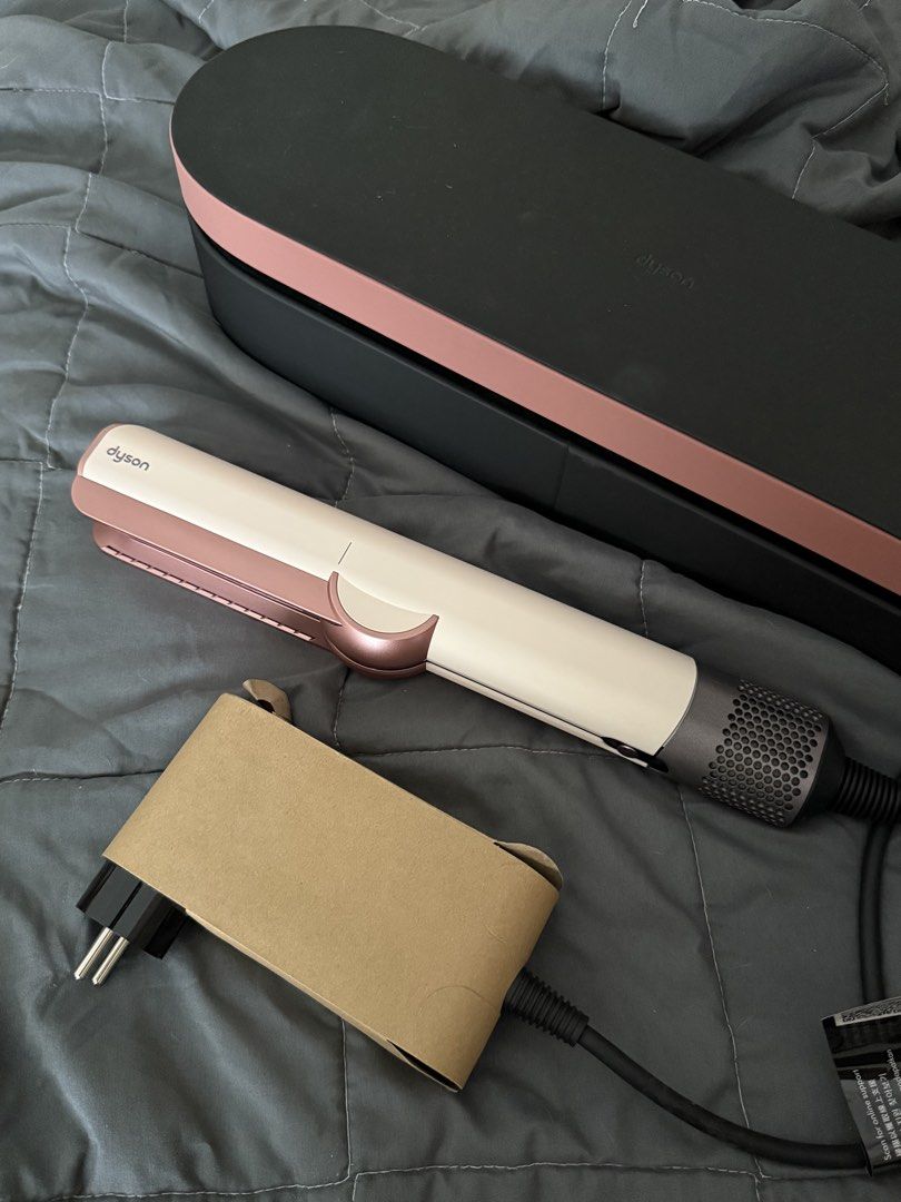 Dyson AirStrait Ceramic Pink/Rose Gold (Category: Hair) located in Paranaque City. Submitted by cescag (Listing ID 1422557248, Image 1). Description: From Korea 34,900 in PH but no presentation case RFS Hindi nagagamit. .