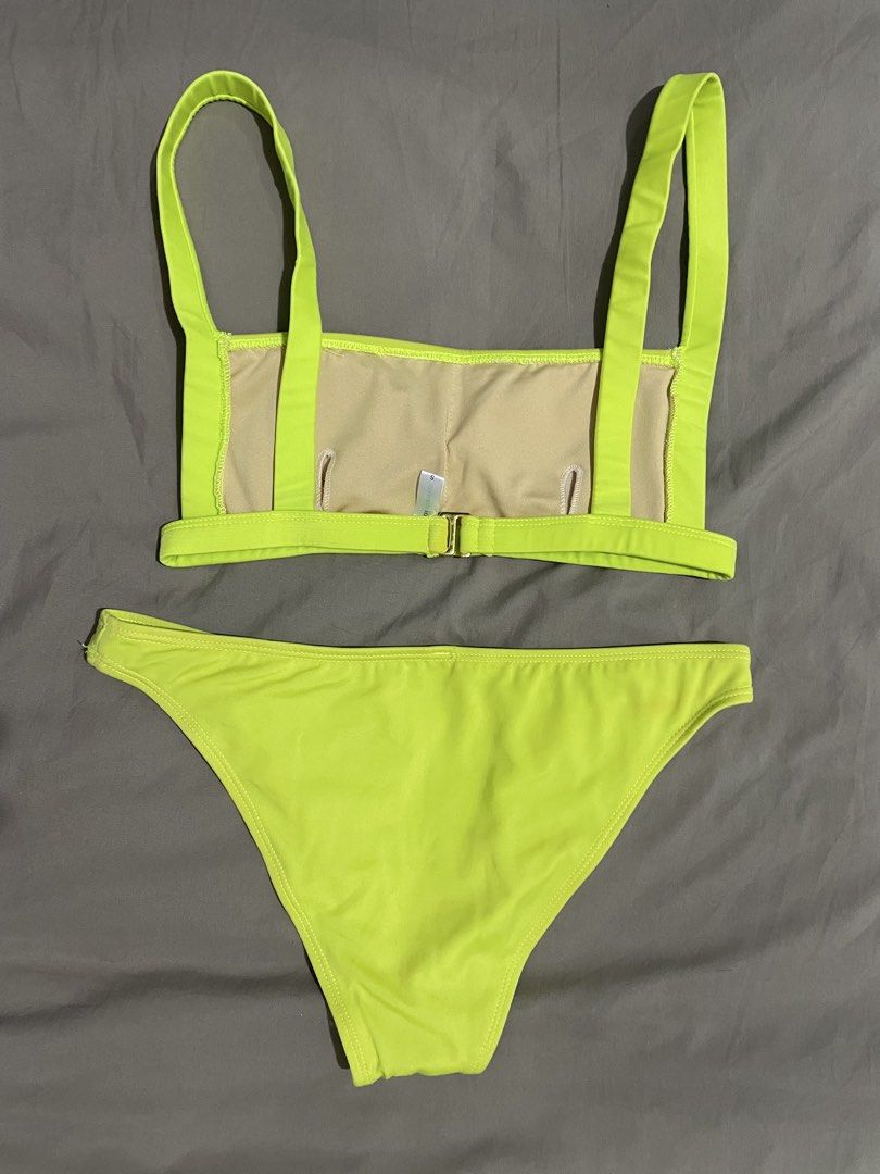 Eighth Mermaid Neon Green Bikini (Category: Bikinis & Swimsuits) located in San Pedro. Submitted by kayee.b (Listing ID 1422589910, Image 2). Description: - Eighth Mermaid bikini set - Neon green color - Size: Small - Top: Thick straps, clasp closure - Bottom: Classic cut - With signs of usage, discoloration, but quality is still superb, material is very stretchy.