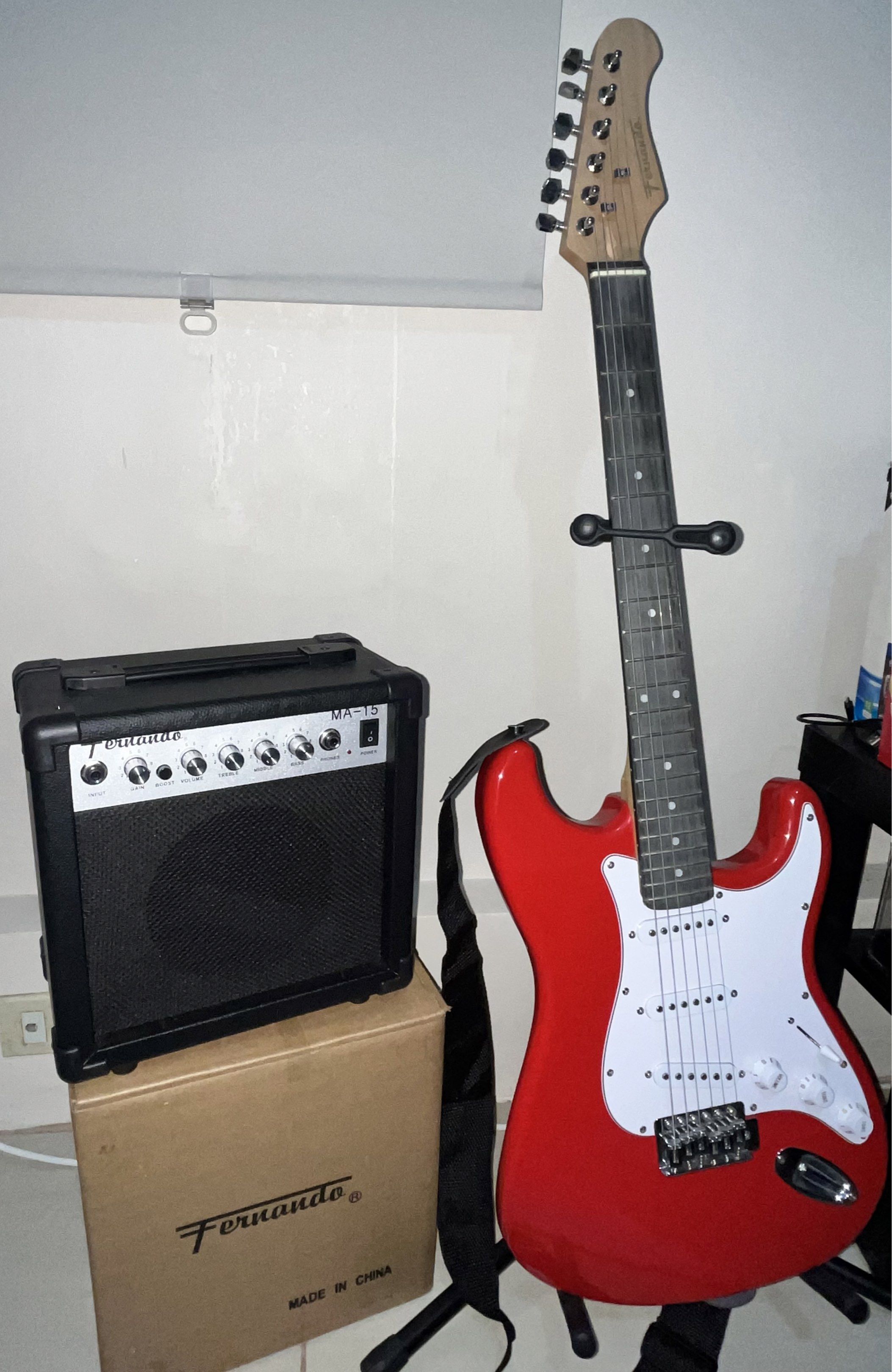 Fernando Red Electric Guitar Set with Amplifier (Category: Musical Instruments) located in Manila. Submitted by riestler (Listing ID 1422644656, Image 1). Description: - 8 months old - full inclusion .