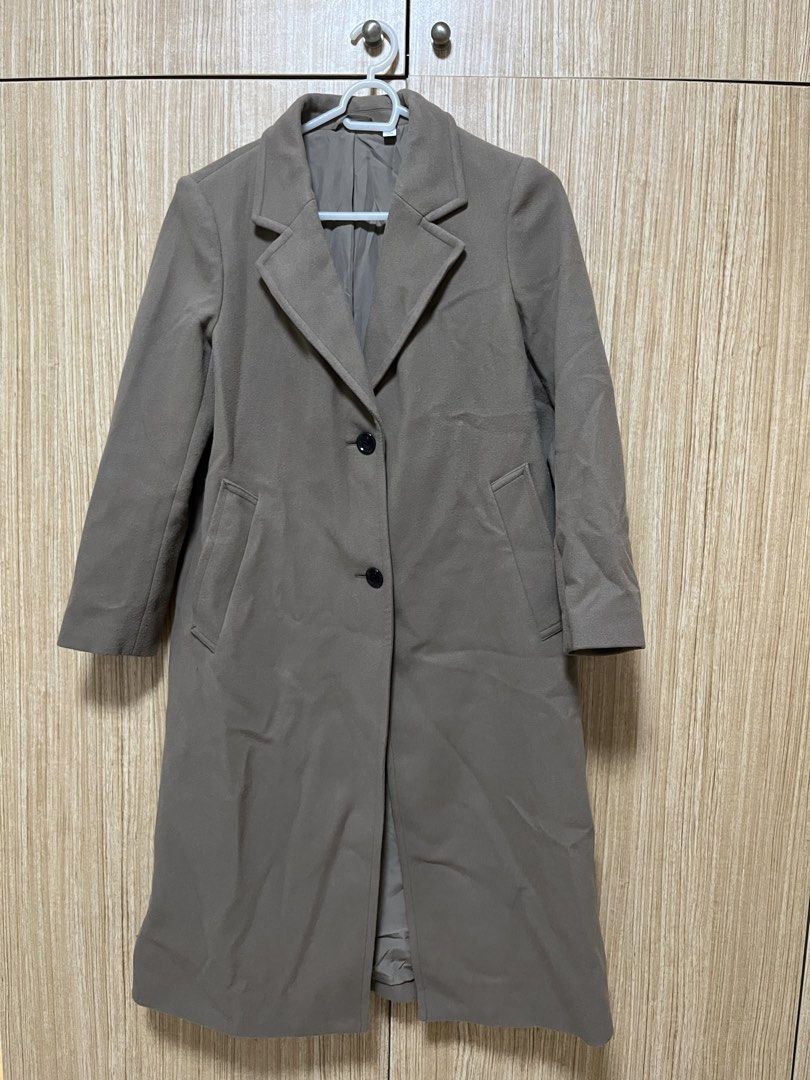 GU Long Coat - Small (Category: Coats, Jackets and Outerwear) located in Taguig. Submitted by kdf13 (Listing ID 1422662042, Image 1). Description: - GU long coat - Size: S - Classic design with button closure - Features pockets - Neutral color - Made in Vietnam - Soft material - Great for layering.