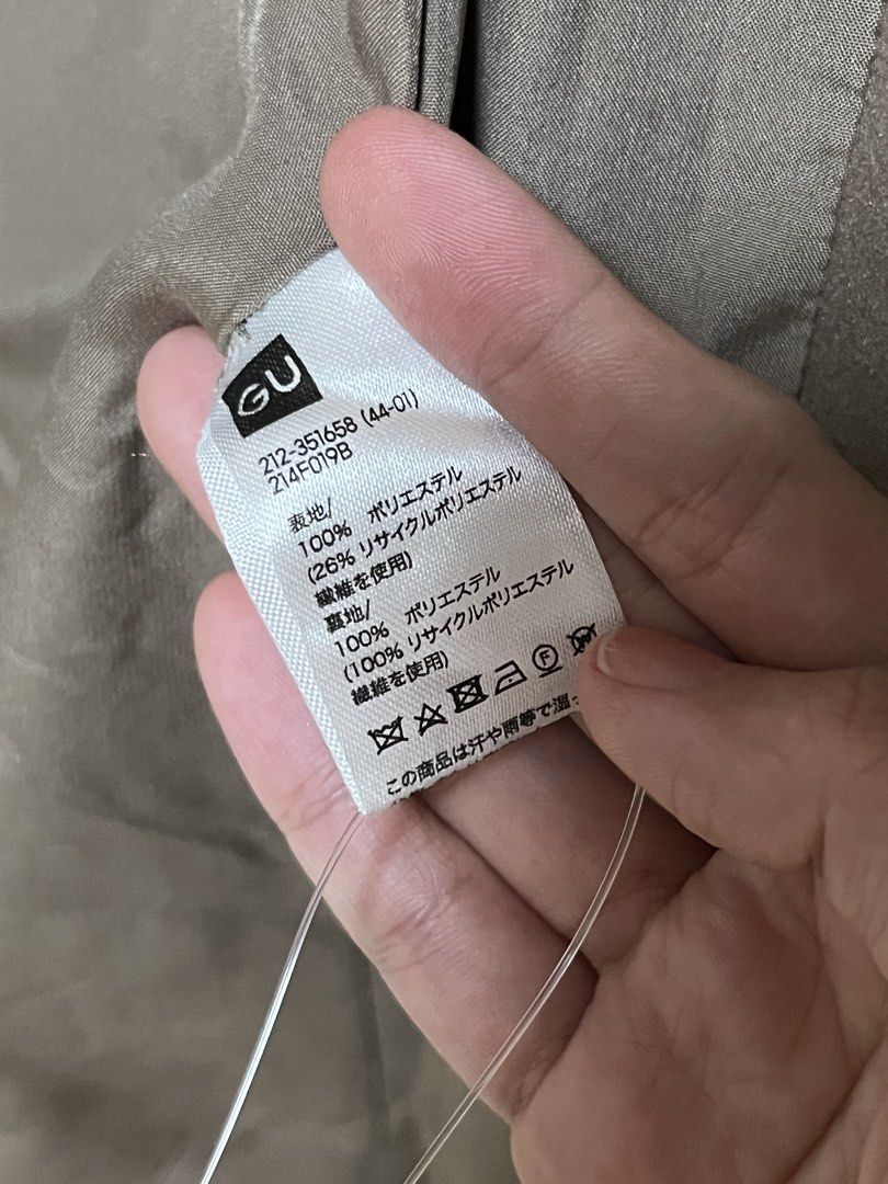 GU Long Coat - Small (Category: Coats, Jackets and Outerwear) located in Taguig. Submitted by kdf13 (Listing ID 1422662042, Image 3). Description: - GU long coat - Size: S - Classic design with button closure - Features pockets - Neutral color - Made in Vietnam - Soft material - Great for layering.