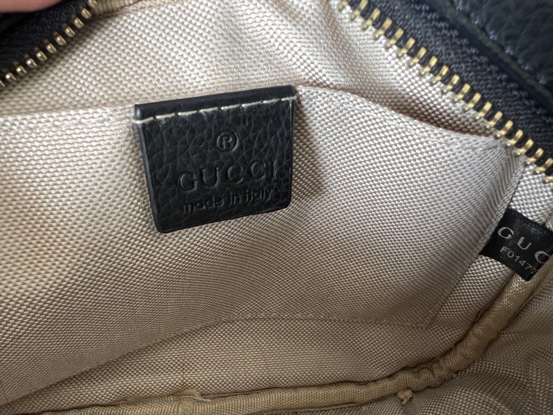 Gucci Soho Disco Bag Black (Category: Luxury Bags & Wallets) located in Imus. Submitted by r_mercado (Listing ID 1422551743, Image 3). Description: Authentic Gucci Soho Disco bag in black. Features a leather exterior with the iconic interlocking GG logo. Includes a long adjustable shoulder strap and a tassel zipper pull. The interior has a fabric lining and a small pocket. Comes with authenticity cards. NGA..