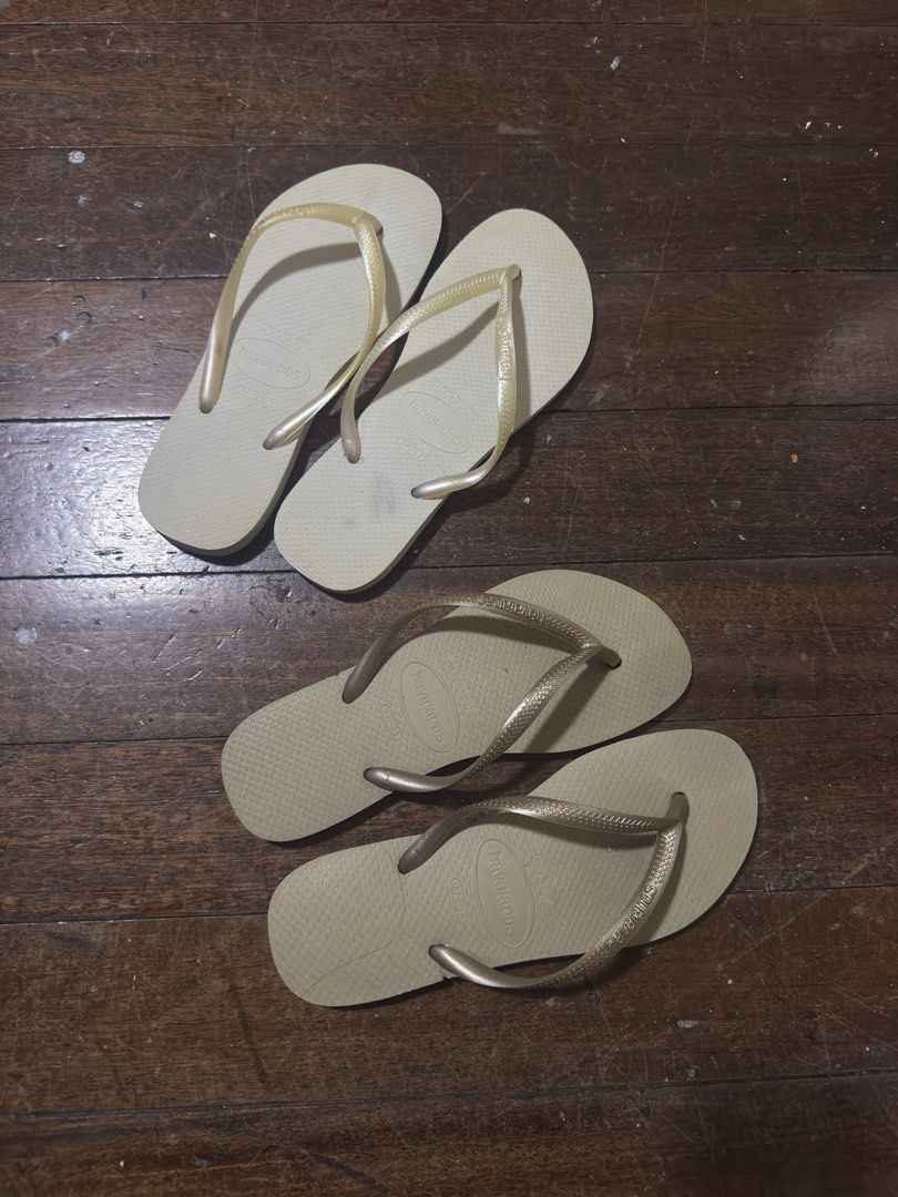 Havaianas Flip-flops (Category: Slippers and slides) located in Manila. Submitted by jemerrysudlon16 (Listing ID 1422591339, Image 1). Description: Pair of Havaianas flip-flops. One pair is beige with gold straps, size 37-38. The other pair is light beige with gold straps. Both pairs have the Havaianas logo on the straps and soles. The soles have a textured pattern for grip. 24 cm 700 each .