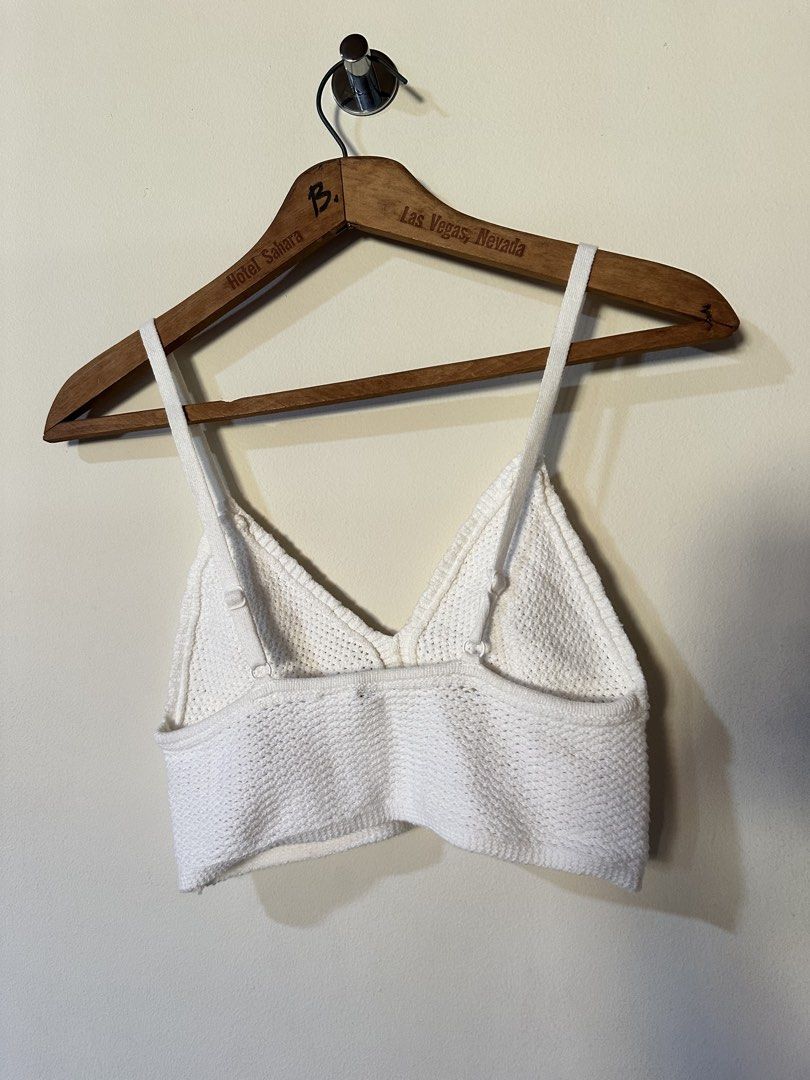 H&M Divided White Knit Bralette Crop Top (Category: Others Tops) located in Muntinlupa City. Submitted by dandelion14 (Listing ID 1422610776, Image 2). Description: - H&M Divided Knit crop top - Color: White - Size: Small (S) - Features adjustable straps - Textured knit fabric - Ideal for high-waisted outfits - Versatile wardrobe staple.