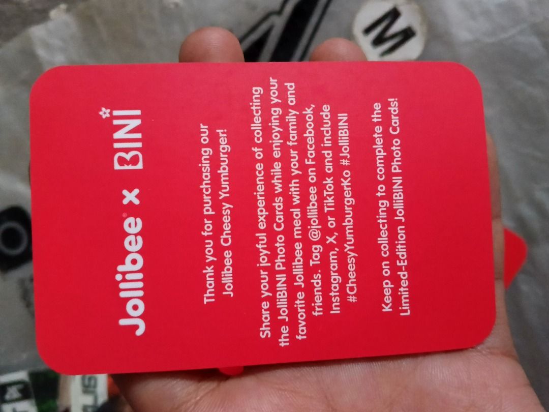 Jollibee x BINI Trading Card (Category: Raw Singles) located in Quezon City. Submitted by sandra_0920 (Listing ID 1422601511, Image 3). Description: - Jollibee x BINI Collaboration Card - Features a BINI member photo - Includes Jollibee and BINI logos - Vibrant red color.