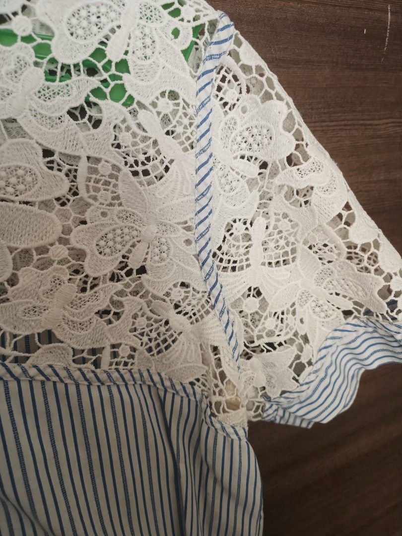 Kamiseta Lace and Striped Top (Category: Blouses) located in San Jose. Submitted by caseyc88 (Listing ID 1422601754, Image 3). Description: - Brand: Kamiseta - Style: Top - Design: Lace and striped - Upper: White lace - Lower: Blue and white stripes - Sleeves: Short - Neckline: Round - Size: Medium.