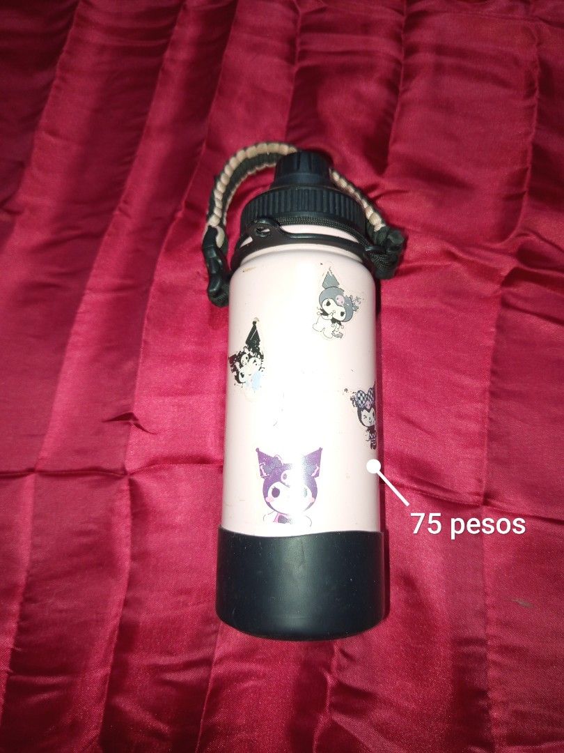 Kuromi Water Bottle (Category: Water Bottles & Tumblers) located in Manila. Submitted by xseki. (Listing ID 1422559416, Image 1). Description: - Kuromi-themed water bottle - Black base and lid with handle - Pink bottle body - Adorned with Kuromi stickers - Price: 75 pesos.