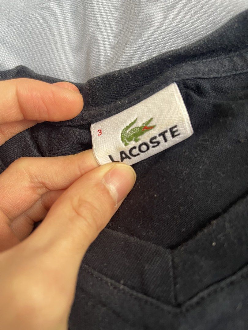 Lacoste Navy V Neck Tee (Category: Tshirts & Polo Shirts ) located in Manila. Submitted by nicooolu (Listing ID 1422587204, Image 2). Description: Lacoste Navy V Neck Tee -Needs wash -L: 25, W: 18.