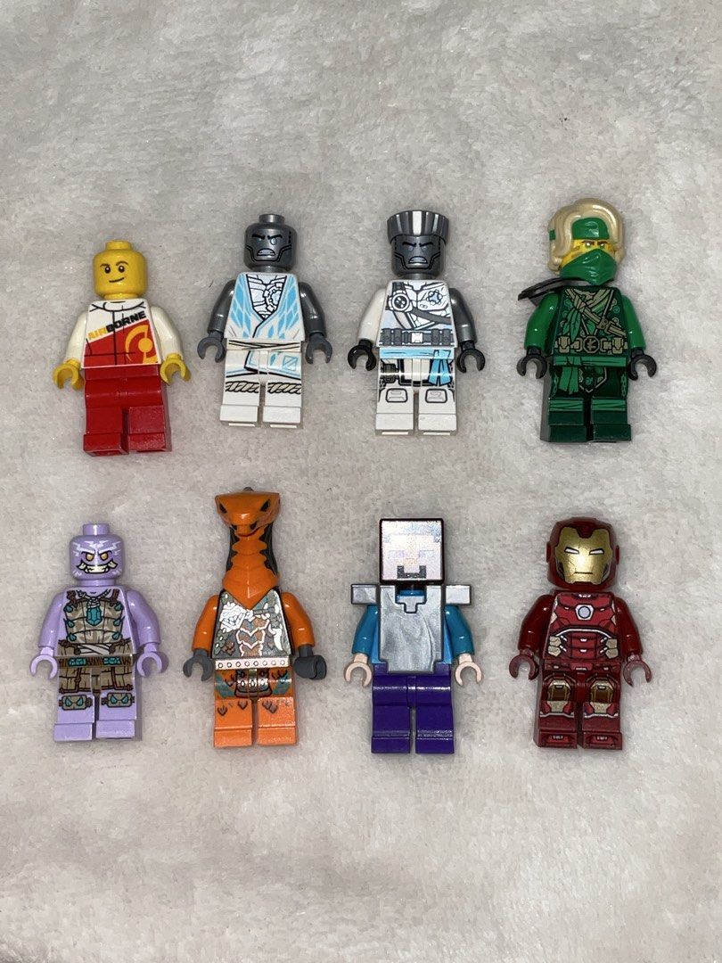 LEGO Minifigures - Various Characters OPEN FOR TAKE ALL (Category: Lego & Building Sets) located in Bacoor. Submitted by pausroom (Listing ID 1422688835, Image 1). Description: Collection of LEGO minifigures - Iron Man with silver hexagon on chest - Ninjago Lloyd, and various other characters. - Also includes two racing figures and several animal figures. - The Iron Man figure is sh612 Marvel D12. - Ninjago Lloyd is from set 71745. Negotiable for