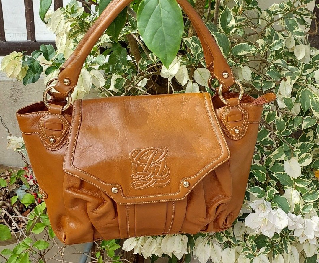 Louie Quartorze (LQ) Tote Short Handle (Category: Luxury Bags & Wallets) located in Gapan. Submitted by purseofjune (Listing ID 1422604447, Image 1). Description: - Brown leather handbag - Flap closure - Gold-tone hardware - Double handles - Spacious interior - Classic design - almost new condition - medium size.