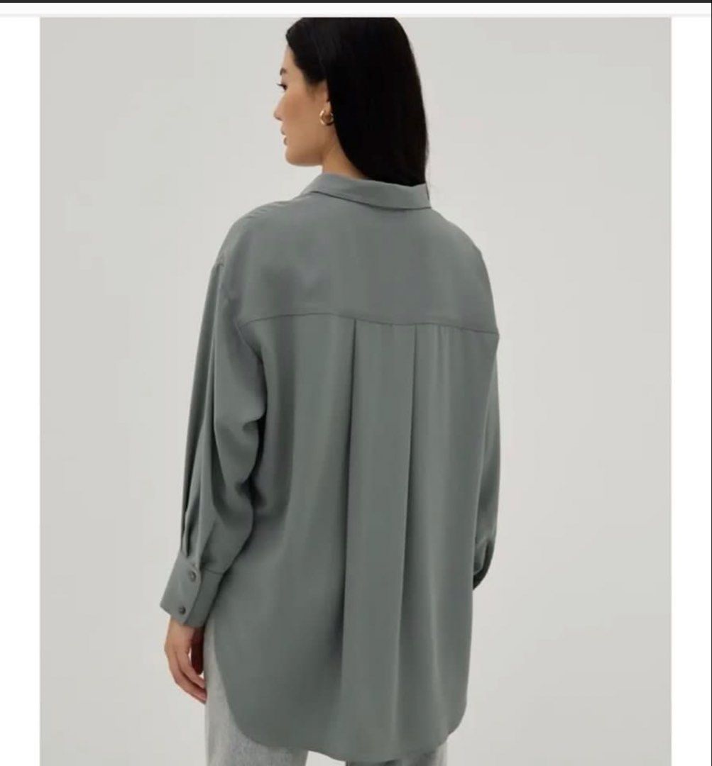 Love Bonito Relaxed Blouse (Blue Silver) (Category: Blouses) located in Cebu City. Submitted by cmy___ (Listing ID 1422656536, Image 3). Description: It’s a size small on the tag, runs very large though. it fits a medium to XL It’s a satin-like material, very classy Never wore this out just tried it on :) For orders outside Cebu city I I ship via J&T express.